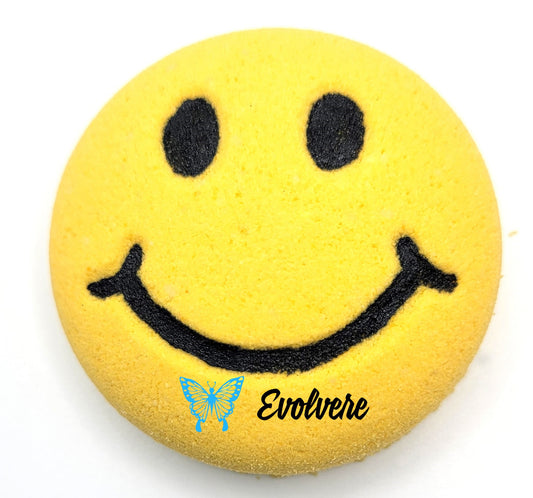 A yellow smiley face Bath Art Bath Bomb.