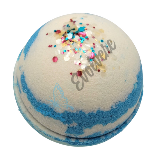 Round blue and white swirled bath bomb topped with beachy colored biodegradable glitter. 