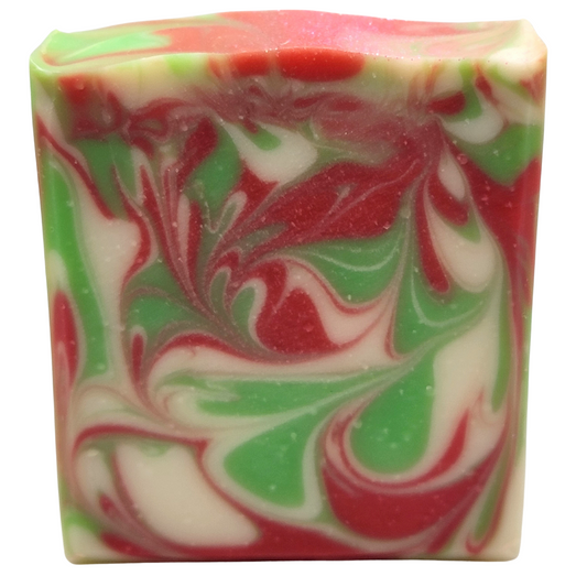 A dark pink, green and white bar of soap. 