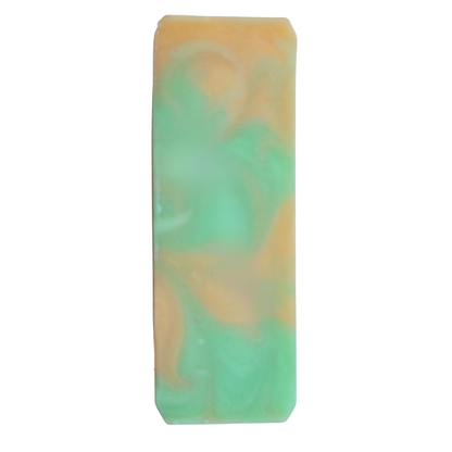 Soap top swirled with tangerine orange and lime green colors