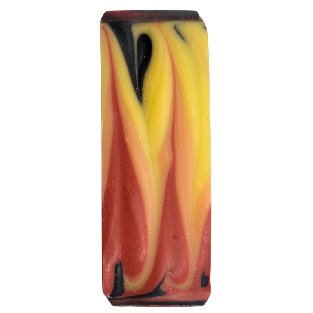 Textured soap top in black, red, yellow and orange.