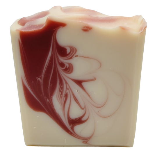 A beautiful white soap with a delicate burgundy swirl. 