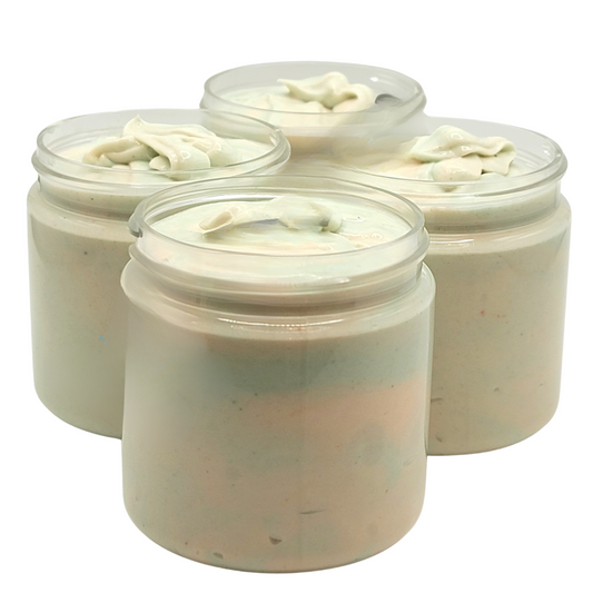 Four 4oz jars filled with a muted green and orange swirled body butter.  Listing is for 1 jar. 