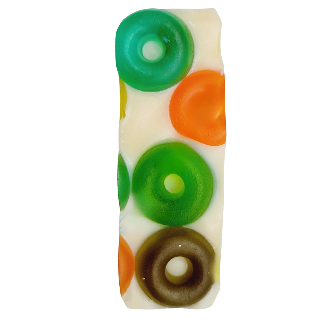 White soap top with fruit loop shaped and colored melt & pour soap.