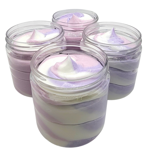 Four 4 ounce jars filled with a rich body butter swirled in 3 colors - white, purple and light purple. 
