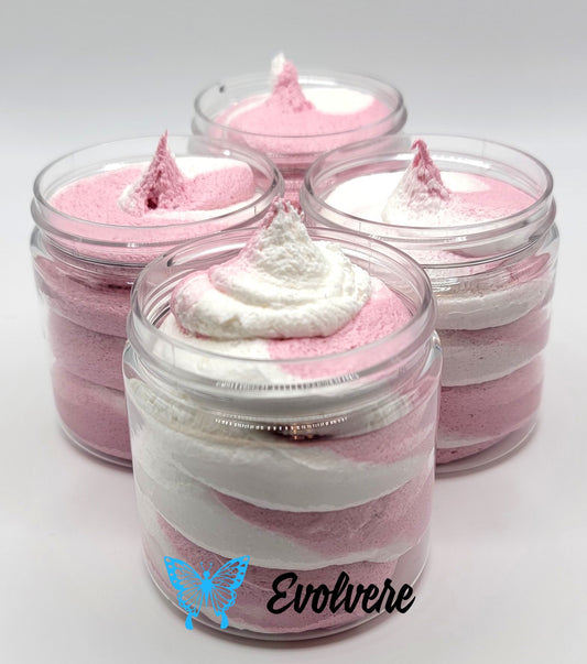 4 jars of a pink and white swirled foaming sugar scrub. Listing is for 1 jar. 