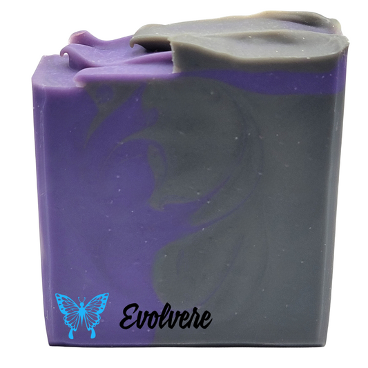 A deep purple and grey soap with wavy top