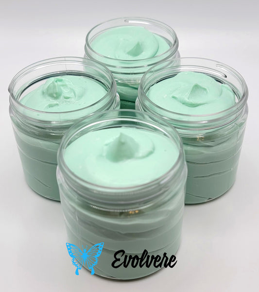 A soft mint colored body butter shown in 4 Four ounce jars. Listing is for 1 jar. 