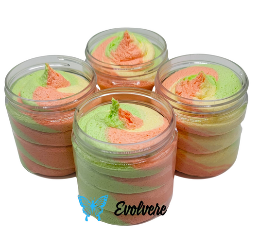 Four 4-ounce jars filled with a green, orange and yellow swirled foaming sugar scrub. Listing is for 1 jar 