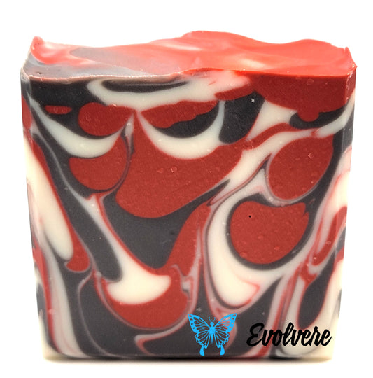 A black white and red swirled bar of soap