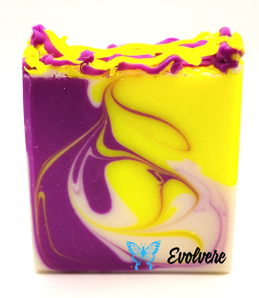 A neon purple, yellow and white swirled soap.