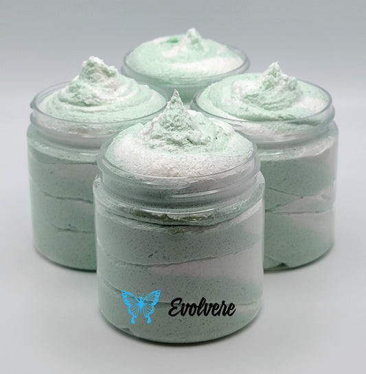 4 jars filled with a green and white swirled foaming sugar scrub. Listing is for 1 jar. 