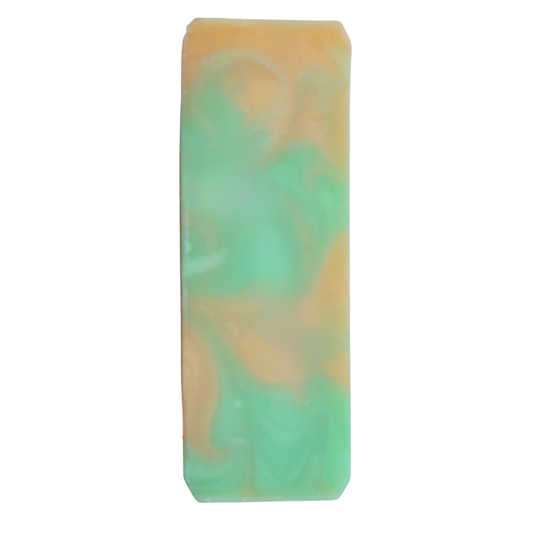 Soap top swirled with tangerine orange and lime green colors