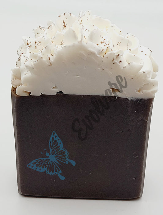 A Brown Soap with a white whipped top to mimic whipped topping of a hot coca drink.